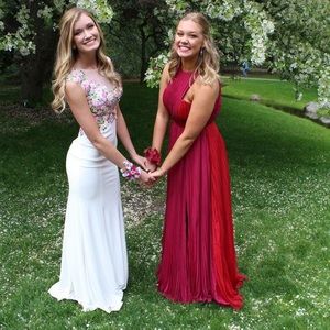 white/floral prom dress shown in pictures.